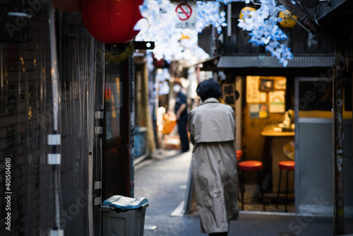 Asian restaurant street view, few people due to COVID-19 lockdown © Sean K