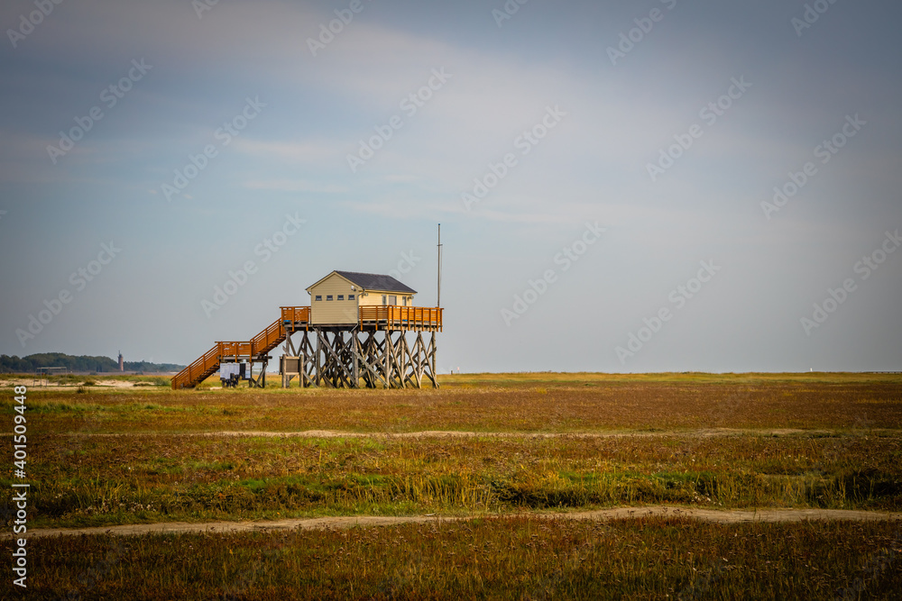 Fototapeta premium Old beach house near St. Peter Ording at the Northsea coast of Schleswig-Holstein, Germany