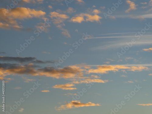 photo of the sky with a beautiful sunrise and golden clouds