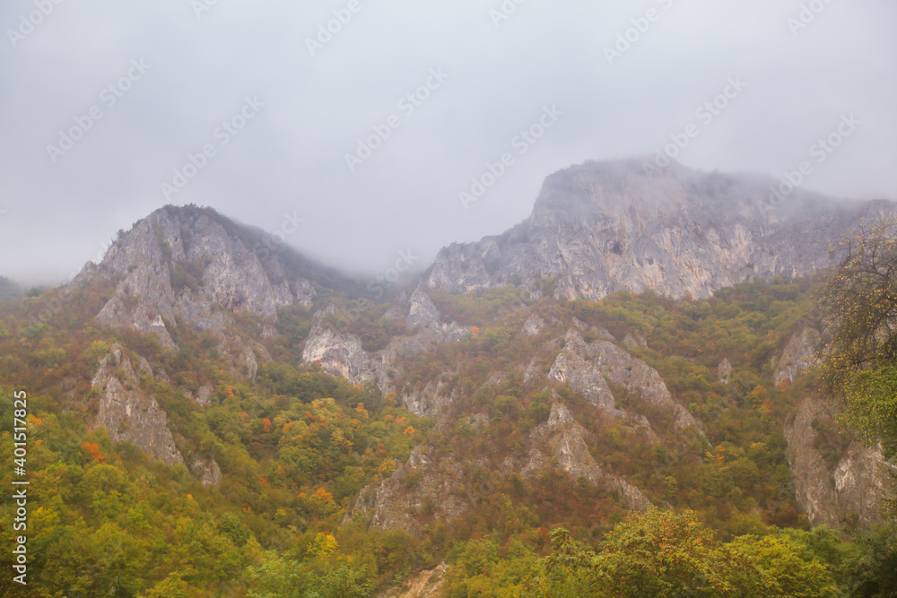 Beautiful nature mountain landscape view. The Ovcar-Kablar Gorge in western Serbia. Autumn day. Cloudy sky.