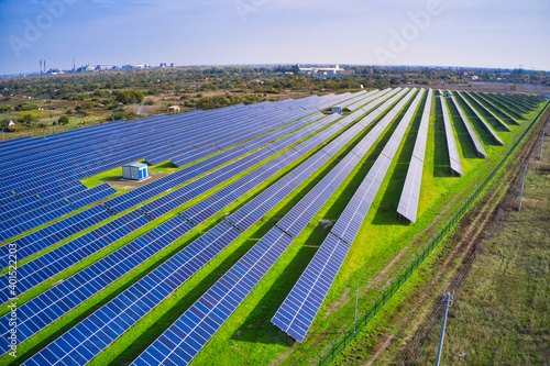 Large solar power plant on a picturesque green field in Ukraine