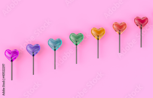 Sweet Valentine's day with heart shape lollipop candy on isolated background. © mim.girl