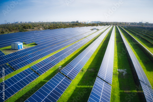 Large solar power plant on a picturesque green field in Ukraine