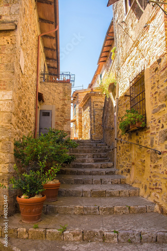 A street of historic stone buildings in the village of Montorsaio in Tuscany, part of Campagnatico in Grosseto province 