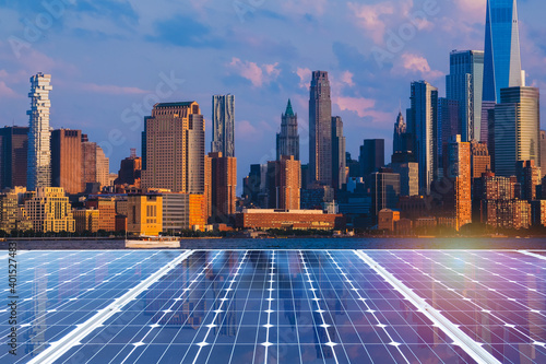 Solar panel over cityscapes, solar power green energy for life concept,New York City USA,