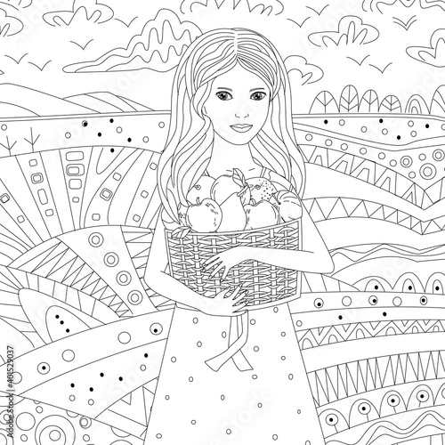 lovely girl holding a basket of fruits standing outdoors against