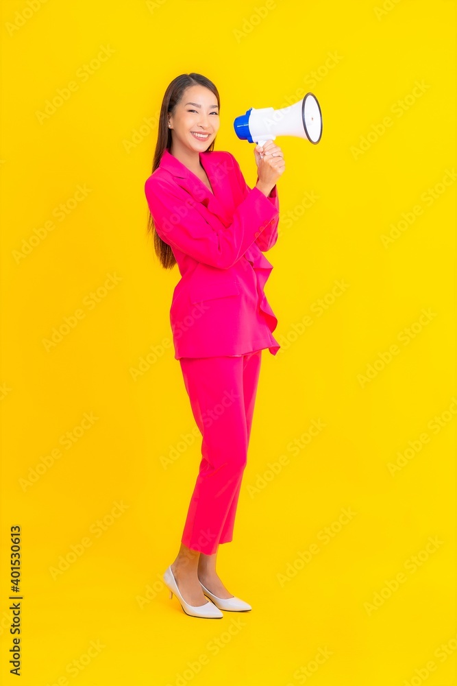 Portrait beautiful young asian woman with megaphone for communication Portrait beautiful young asian woman with megaphone for communication