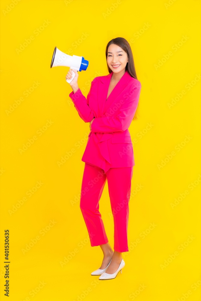 Portrait beautiful young asian woman with megaphone for communication Portrait beautiful young asian woman with megaphone for communication
