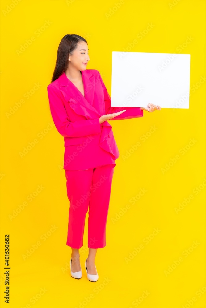 Portrait beautiful young asian woman with empty white billboard Portrait beautiful young asian woman with empty white billboard