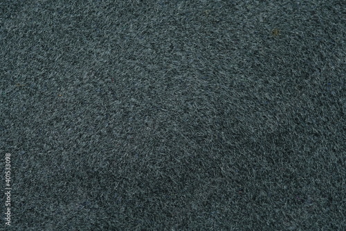 Grey fur leather hairy texture background. Image photo