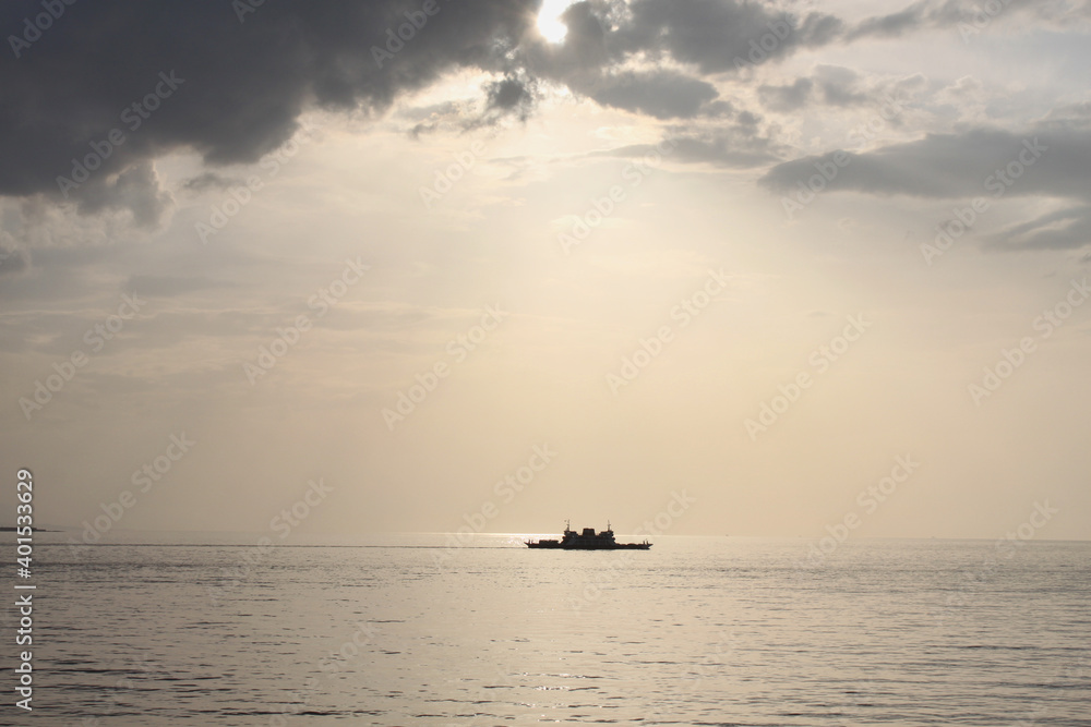 Boat on Hellespont under the evening lights Boat on Hellespont under the evening lights