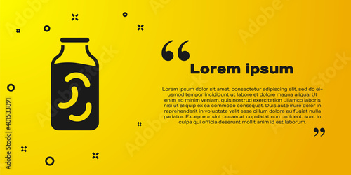 Black Pickled cucumbers in a jar icon isolated on yellow background. Vector.