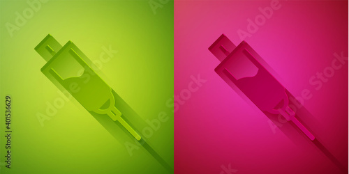 Paper cut Doping syringe icon isolated on green and pink background. Paper art style. Vector.