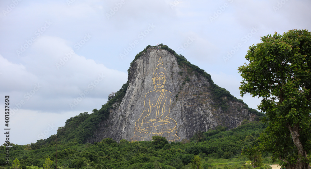 Huge and beautiful Buddha Mountain made by laser at Khao Chi Chan at Chonburi Thailand
