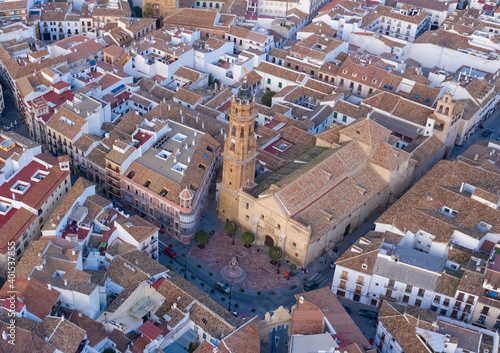 Central square of typical medieval city in South Spain seen from above. Aerial views of the Antequera church