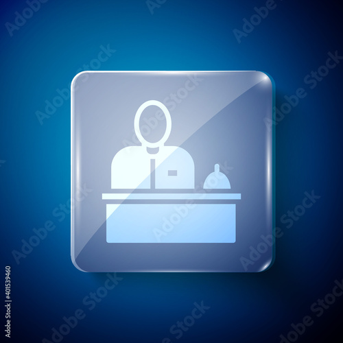 White Receptionist standing at hotel reception desk icon isolated on blue background. Square glass panels. Vector.