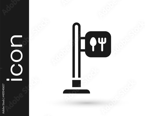 Black Cafe and restaurant location icon isolated on white background. Fork and spoon eatery sign inside pinpoint. Vector.. © Kostiantyn