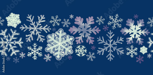 Grey blue and white snowflakes on a dark blue background in a seamless pattern for border