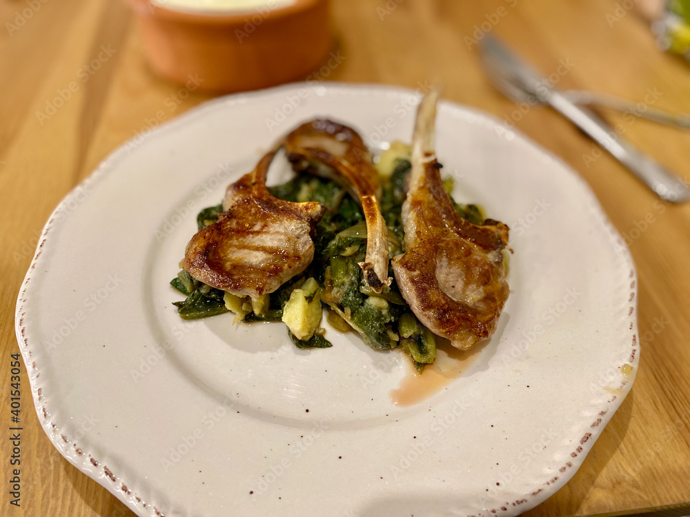 Homemade Lamb Chops with Chard Food Vegetables and Potatoes served in Plate. Homemade Lamb Chops with Chard Food Vegetables and Potatoes served in Plate.