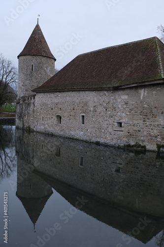 A castle of Hallwil in central Switzerland on a foggy winter day photo