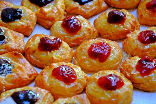 Delicious homemade strawberry and blueberry Danish ready to serve. © Supratchai