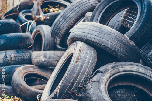 A bunch of old tires from used cars.
