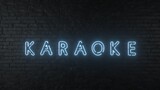 Karaoke neon sign on dark brick wall background. 3D illustration
