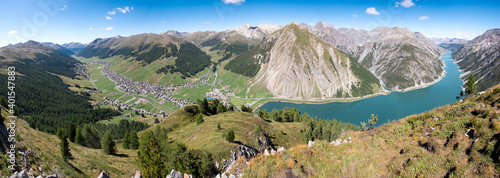 Tableau sur toile Panoramic view from the Crap de la Pare of Livigno and its lake.