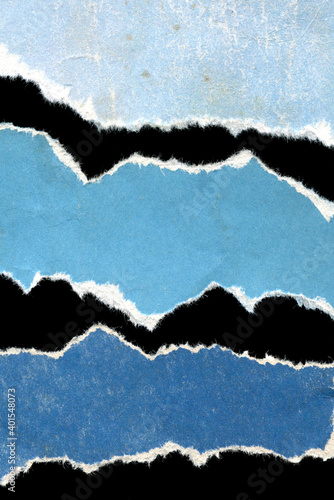Old vintage torn blue paper texture background