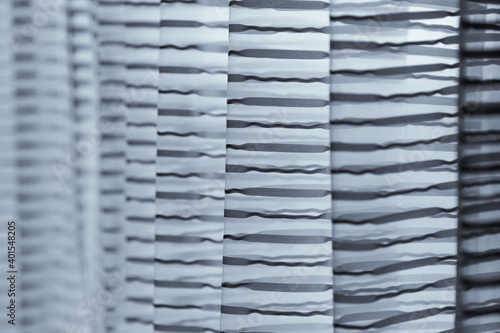 Window blinds with striped fabric  for background use  with selective focus
