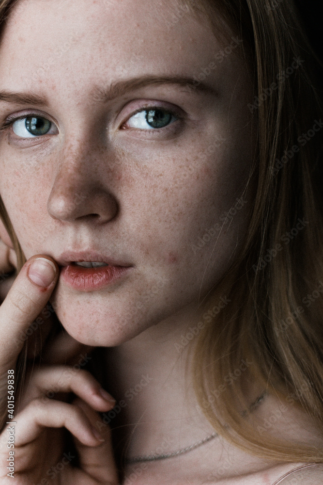 portrait of a young woman with blonde hair. Nature face portrait of a young woman with blonde hair. Nature face