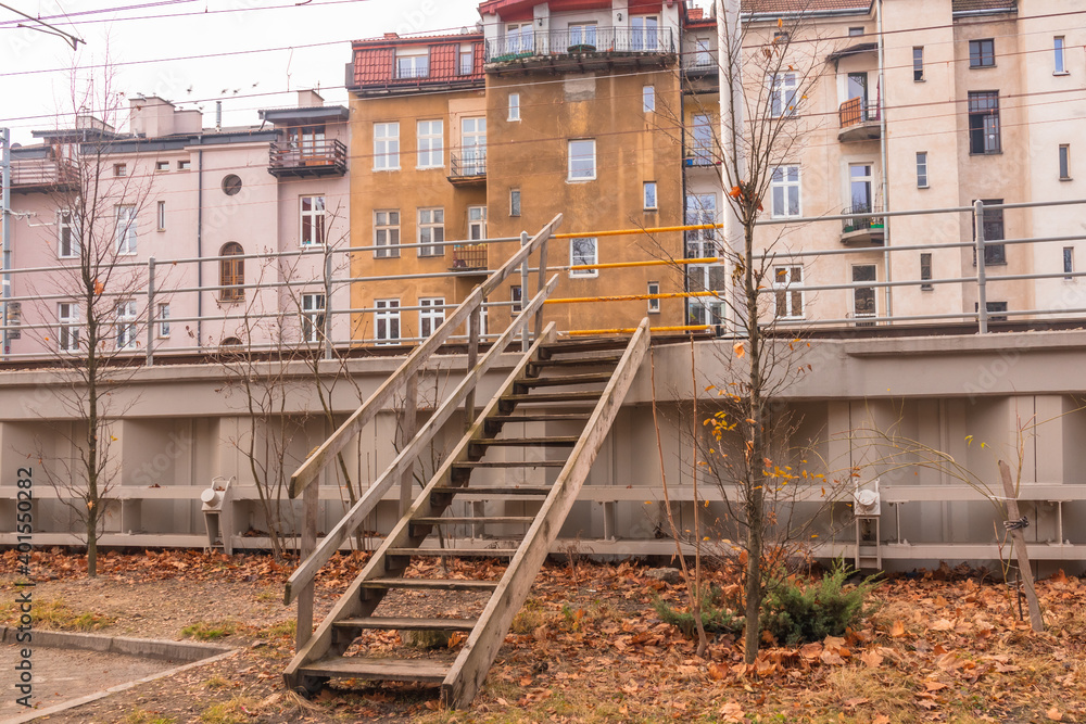autumn, yellow leaves, cityscape, houses, wooden stairs, platform for electric trains