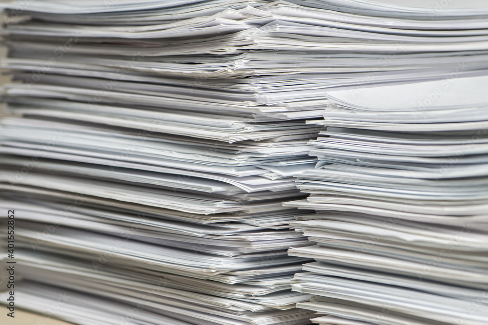 bundles bales of paper documents. stacks packs pile on the desk in the office bundles bales of paper documents. stacks packs pile on the desk in the office