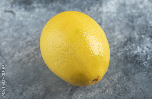 Close up photo of yellow fresh lemon