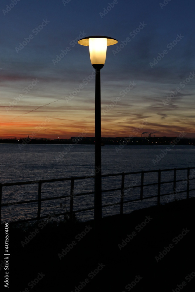 Street lamp at dusk on the banks of the Elbe Street lamp at dusk on the banks of the Elbe