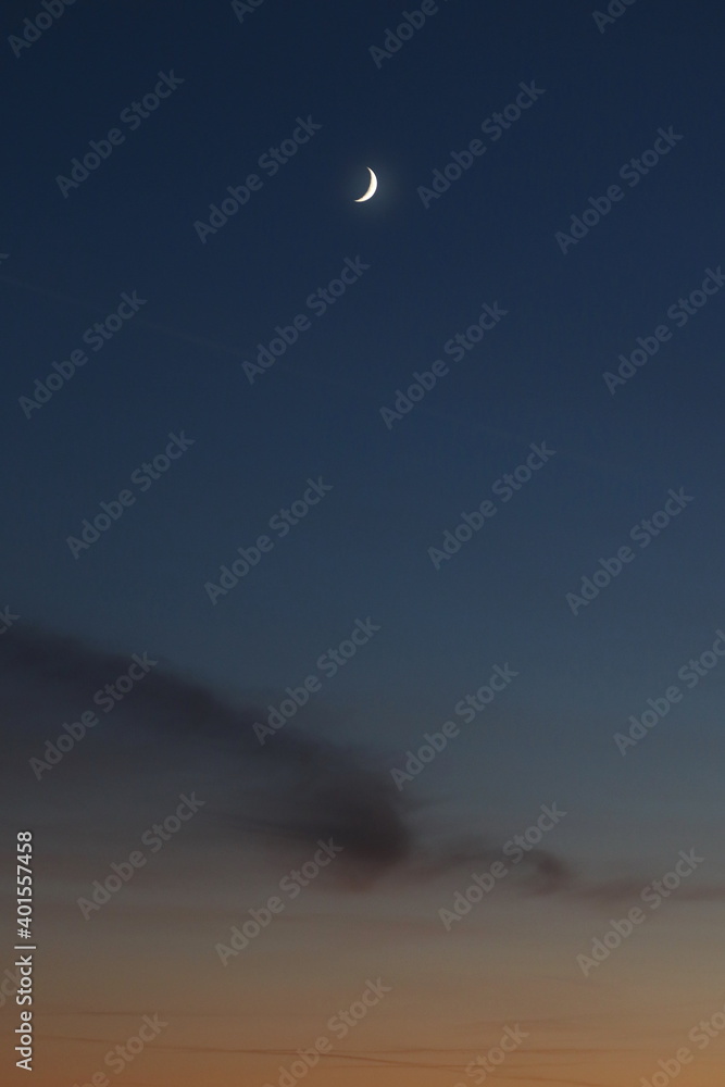 Sky with moon in afterglow
