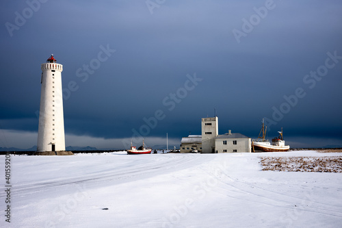 lighthouse in the snow photo