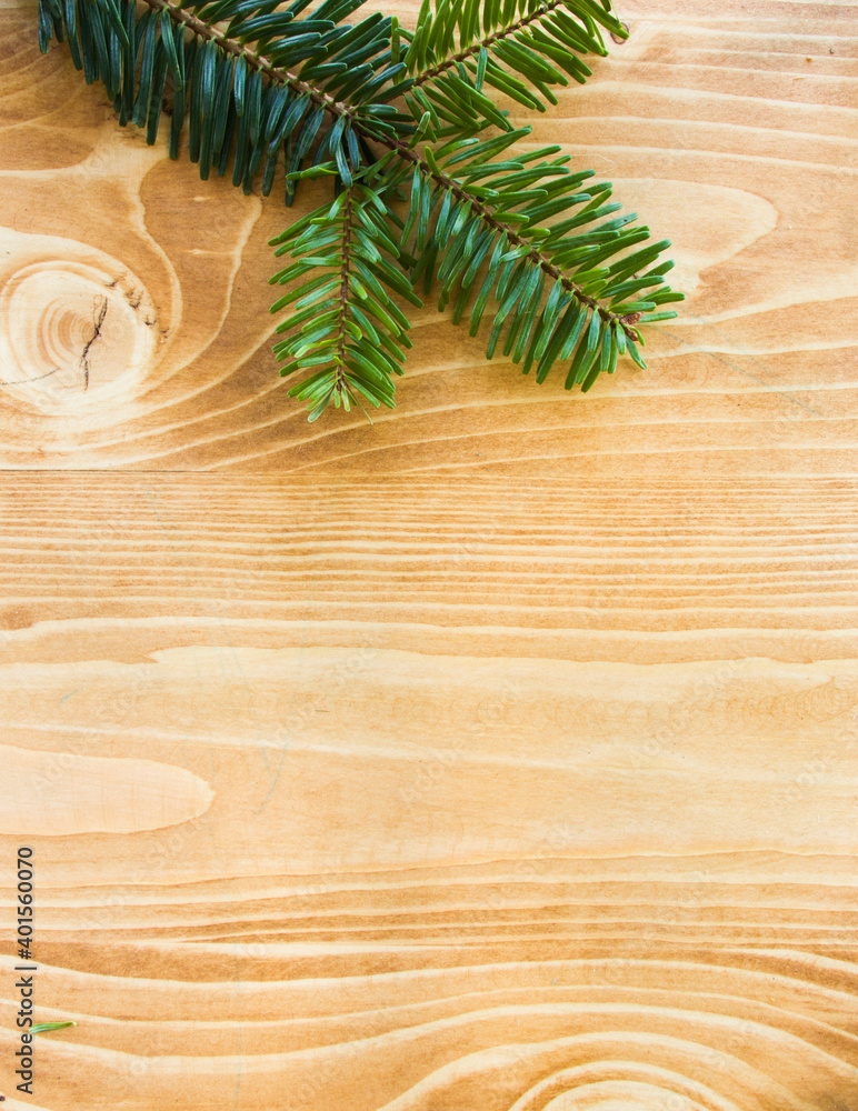 Spruce branches on a wooden background. New Year background. Christmas. Spruce branches on a wooden background. New Year background. Christmas.
