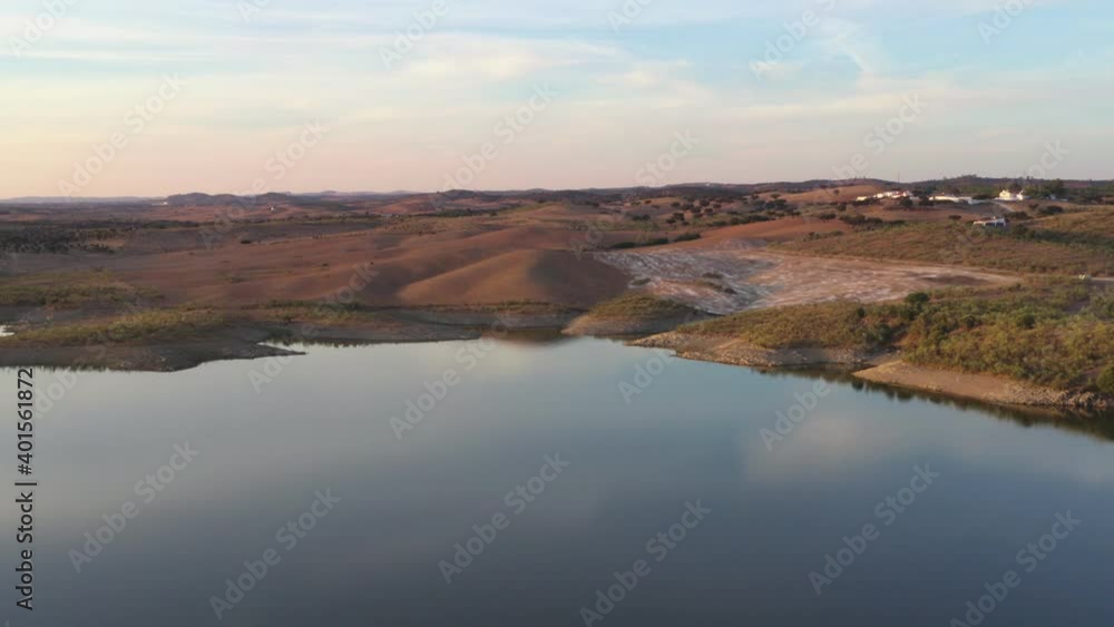 Drone aerial panorama of a desert like hill landscape with marble stones dust at sunset in Terena, Portugal Drone aerial panorama of a desert like hill landscape with marble stones dust at sunset in Terena, Portugal