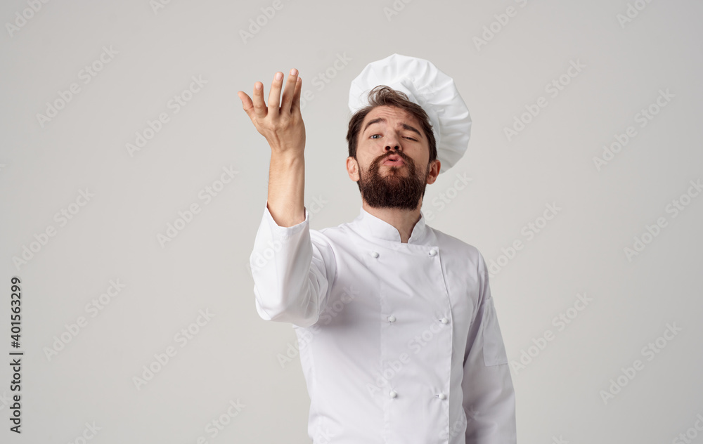 a chef in a light suit gesturing with his hands a professional in his field cooking model a chef in a light suit gesturing with his hands a professional in his field cooking model