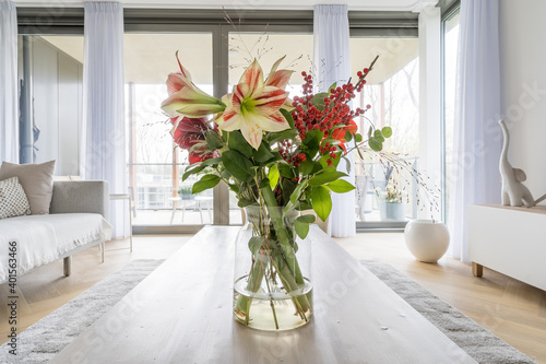Mixed flowers in a vase in a modern interior