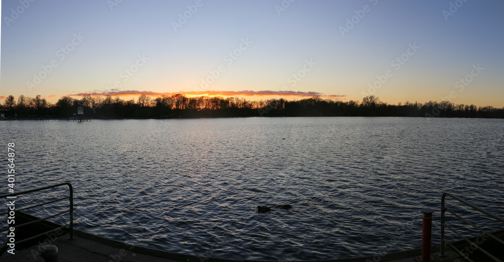 Panoramic view of city lake Maschsee at sunset in Hanover, Germany