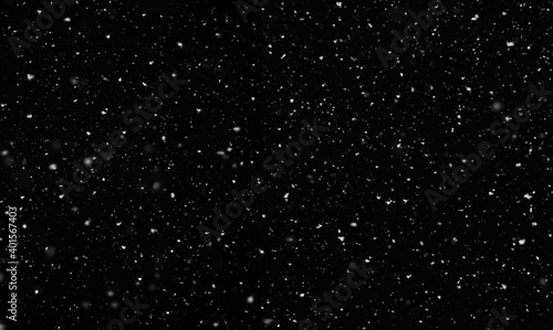 Obraz na plátně Falling snow isolated on black background