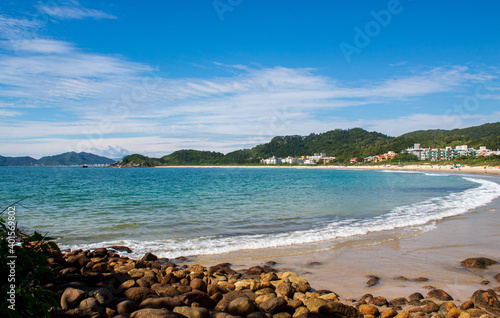 beach with sky located at Quatro Ilhas Beach, Bombinhas, Santa Catarina, Brazil