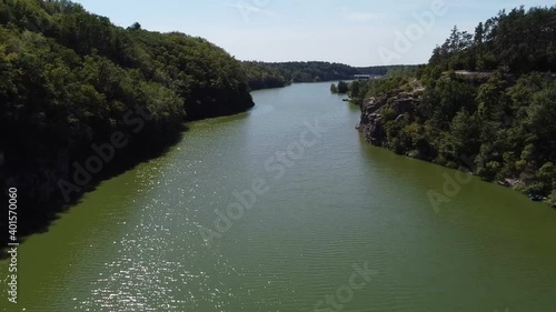 View of the river and trees on the bank. Park near Teteriv River. View from the top. Drone Video. Zhytomyr. Ukraine. Europe photo