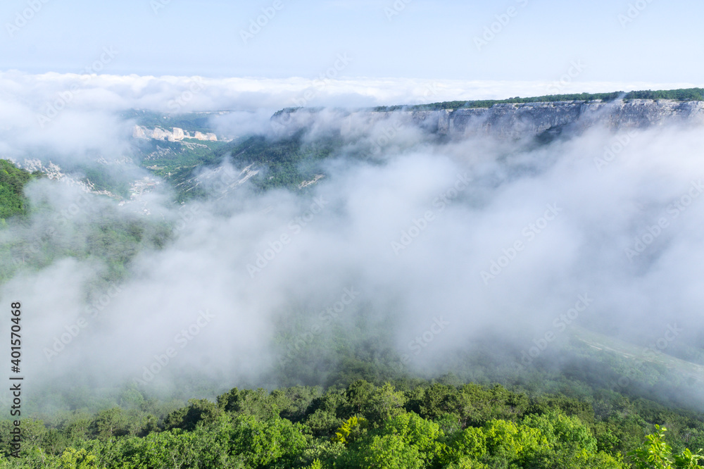 Dawn in the mountains, Above the clouds, mountains in the fog, Crimea, Russia