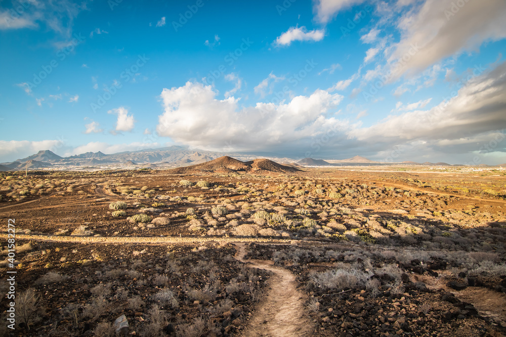 dry arid hot landscape along the hiking trail on a trekking trought Tenerife island, Canary Islands, Spain.