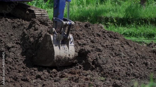 Wallpaper Mural industrial bulldozer excavate ground and soil in tropical rain forest Torontodigital.ca
