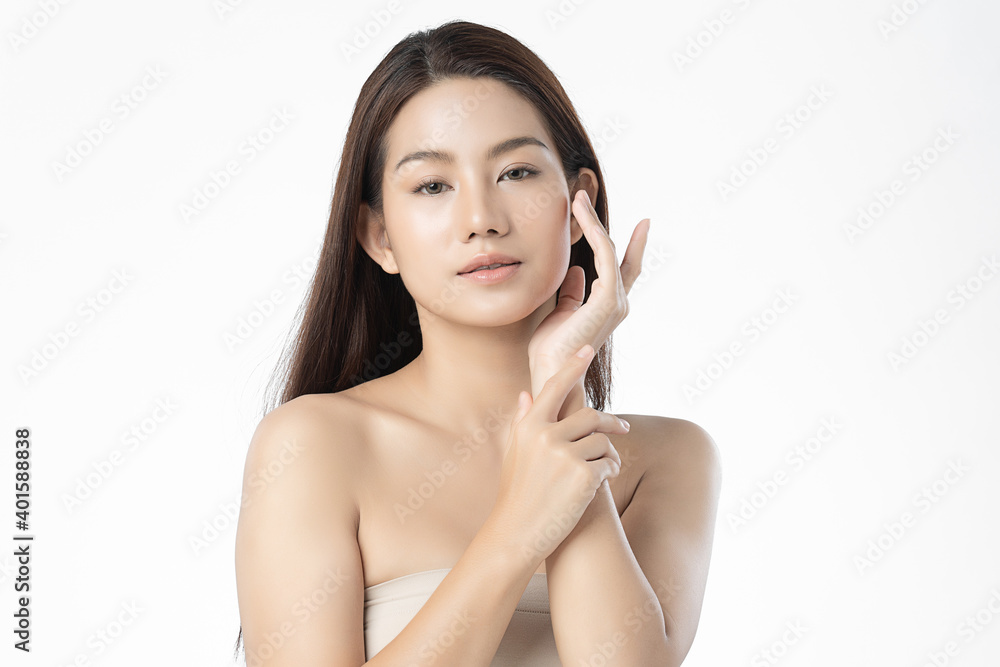 Beautiful Young asian Woman with Clean Fresh Skin, on Pink background, Face care, Facial treatment. Cosmetology, beauty and spa. Asian women portrait Beautiful Young asian Woman with Clean Fresh Skin, on Pink background, Face care, Facial treatment. Cosmetology, beauty and spa. Asian women portrait