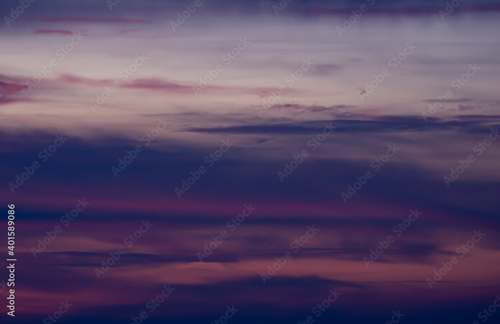 sunset and clouds defocused background